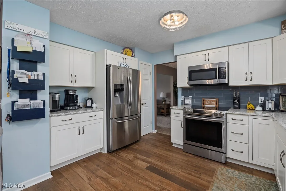 Pantry is next to the refrigerator