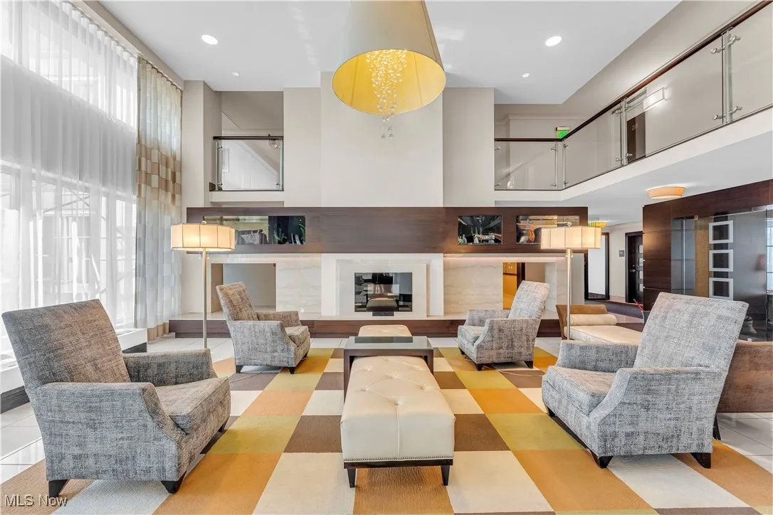 Lobby featuring a high ceiling and recessed lighting