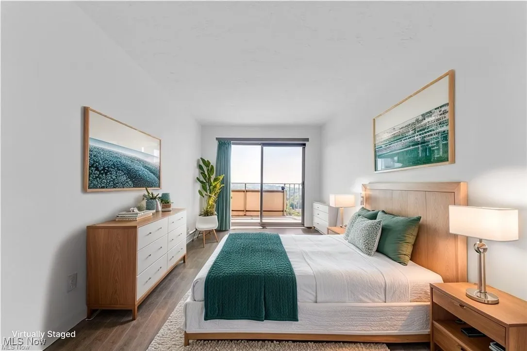 Bedroom featuring wood finished floors