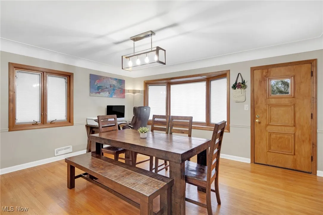 Dining room with light wood finished floors