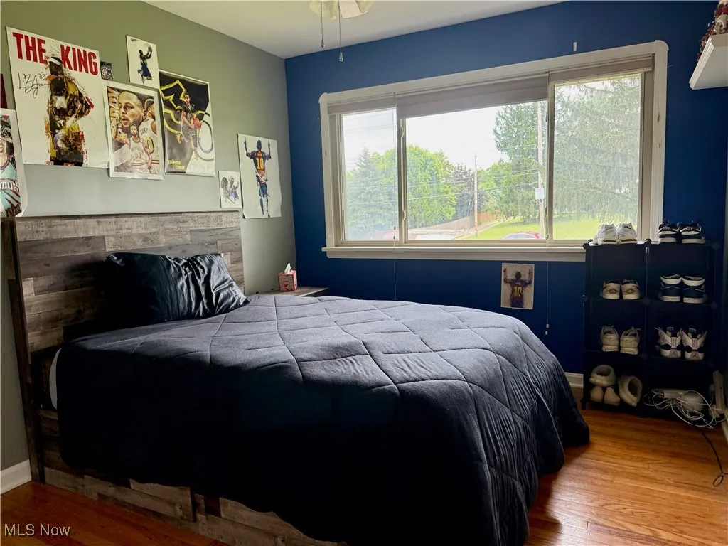 Bedroom with wood finished floors