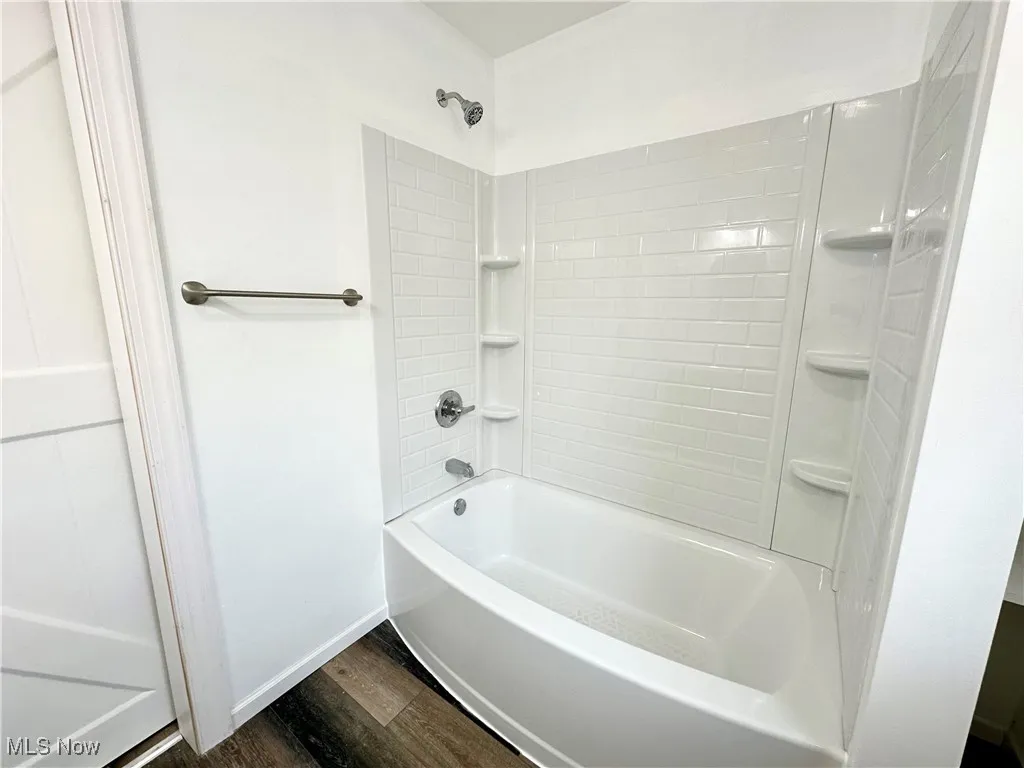 First floor Bathroom with shower / bathtub combination