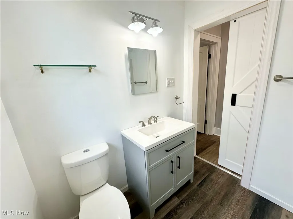 First floor Bathroom with toilet and vanity