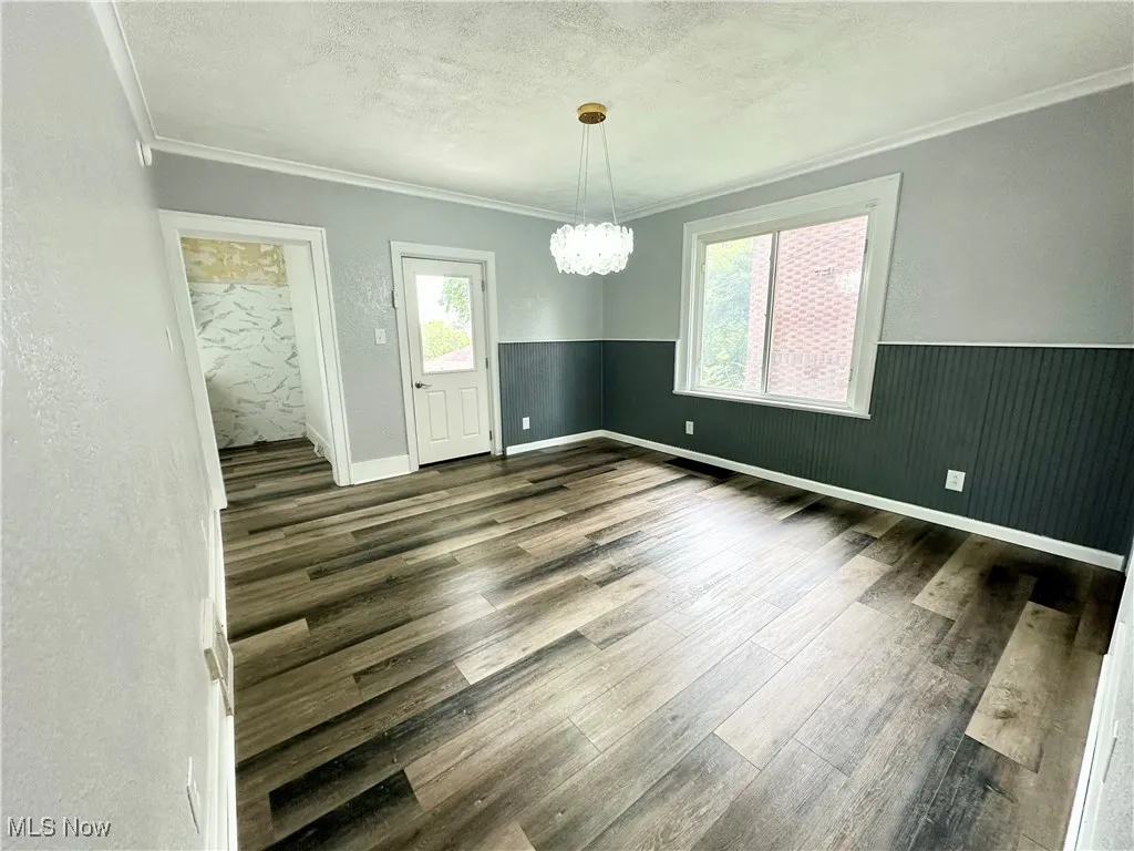 Dining area with a chandelier