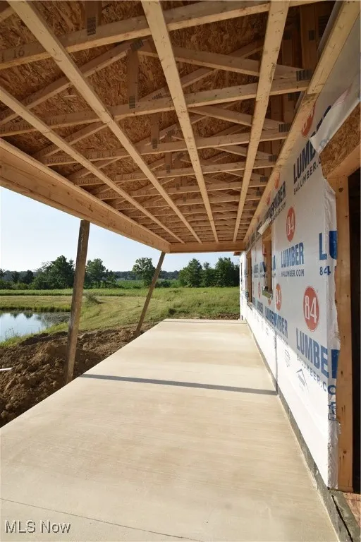 View of patio featuring a water view