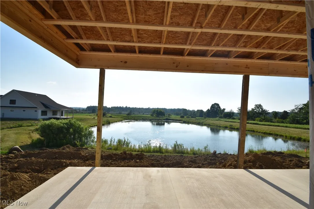 View of patio featuring a water view
