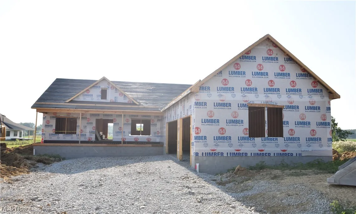 Unfinished property with an attached garage