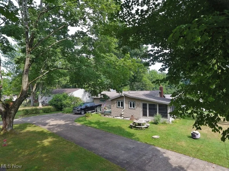 Concrete driveway with plenty of parking