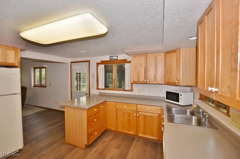 Beautiful Birch kitchen. All appliances remain