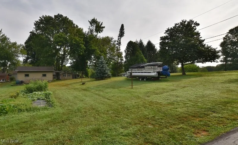 This is a view of the back lot which currently has a garden to grow your fresh vegetable