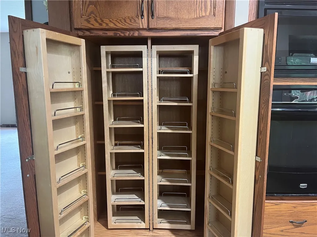 Custom Designed Pantry has multiple built-in and swing out shelves.