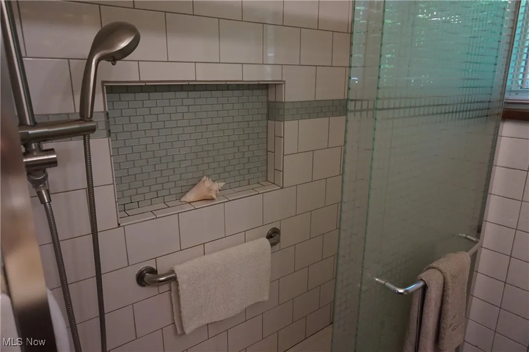 Updated subway tiled walk in shower.