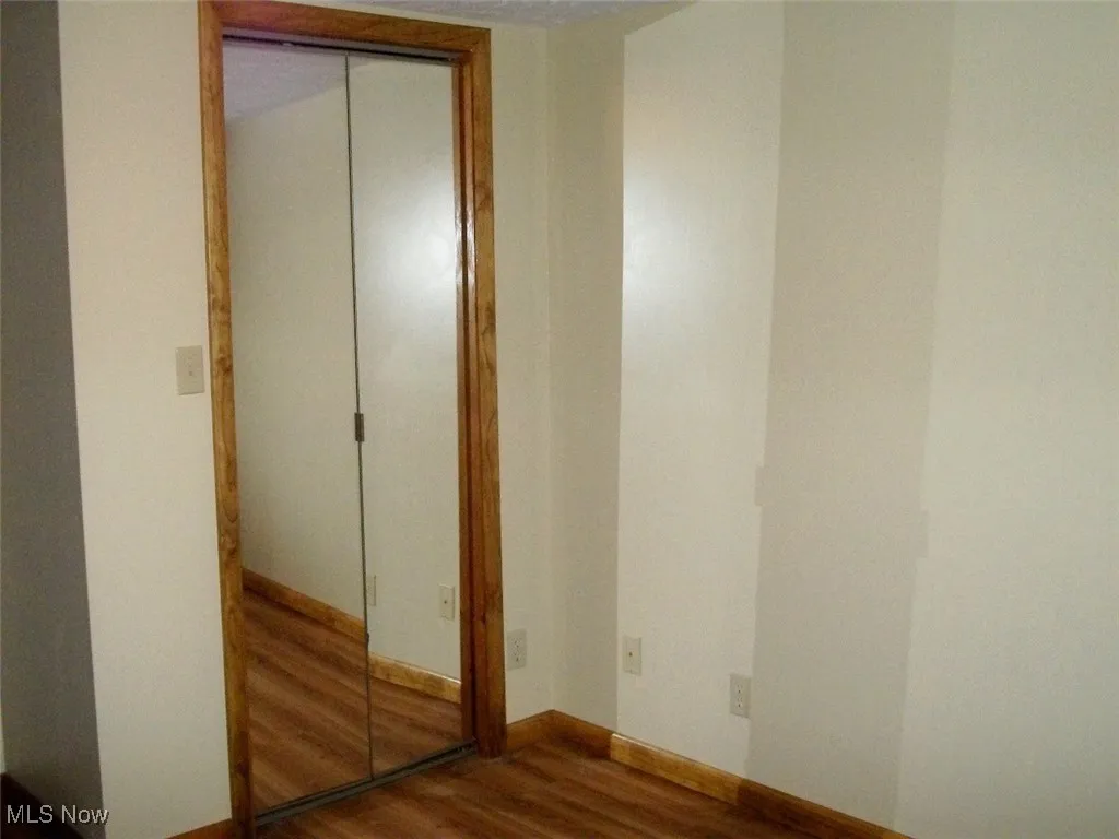 View of Bifold Mirror closet doors in lower bedroom