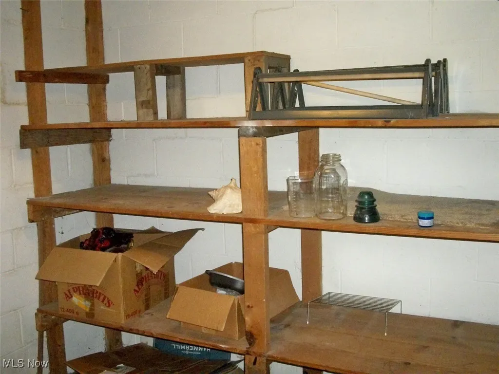 storage room with shelving.