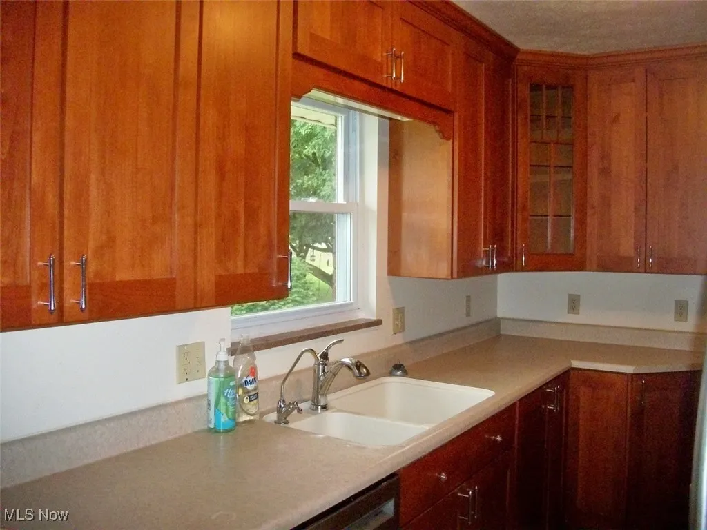 Water filtration system with separate spigot in kitchen.