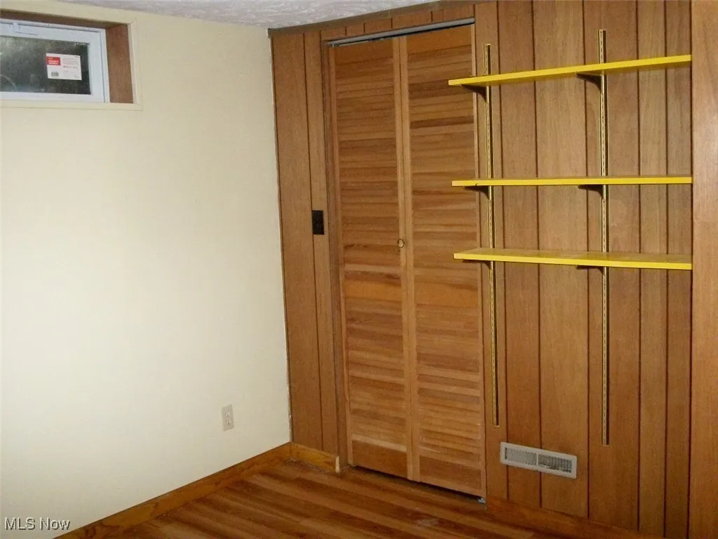 View of second closet in lower level bedroom
