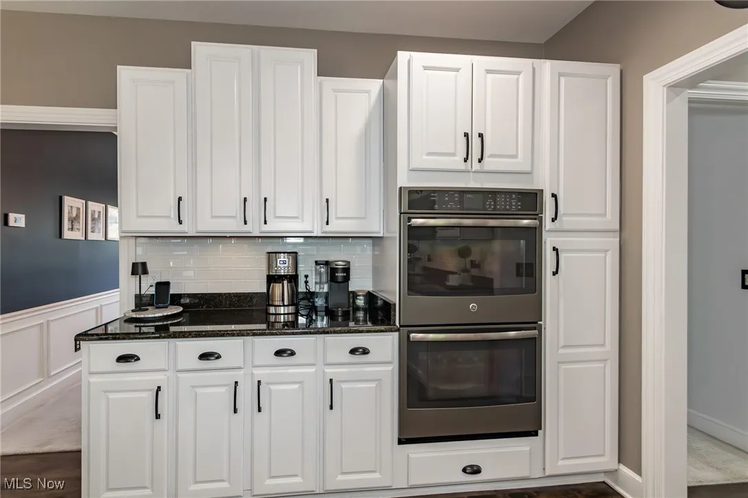 Abundance of cabinets and stainless steel double oven