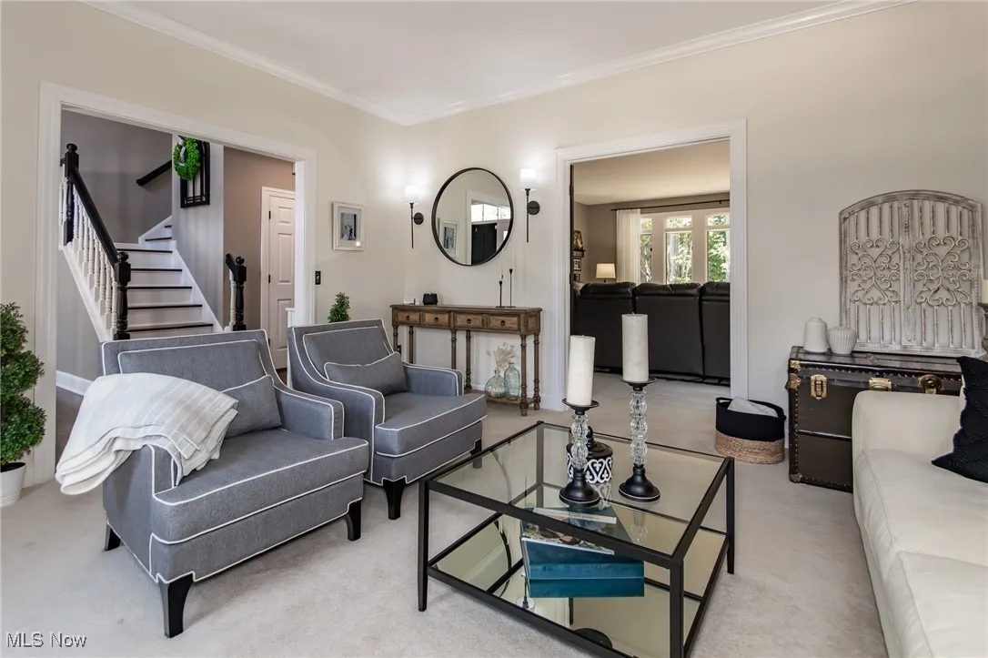 Living area with view of staircase