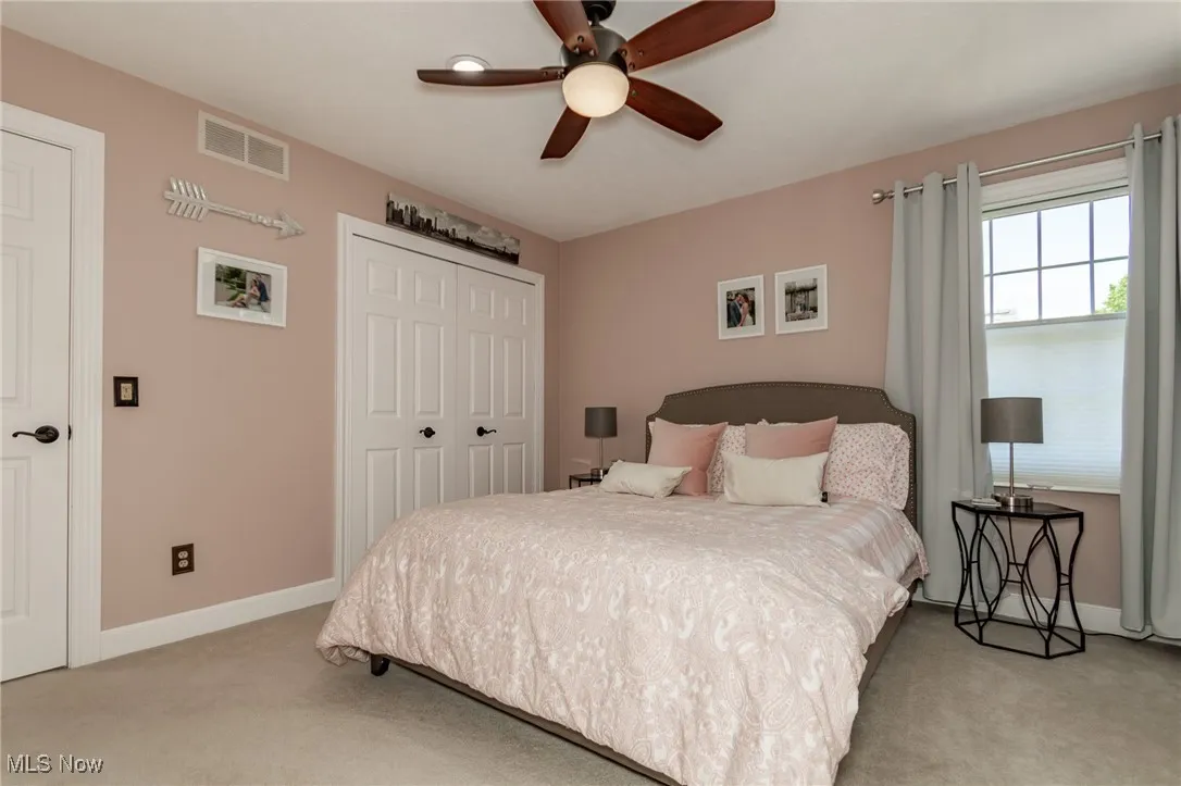 2nd floor guest bedroom with ceiling fan