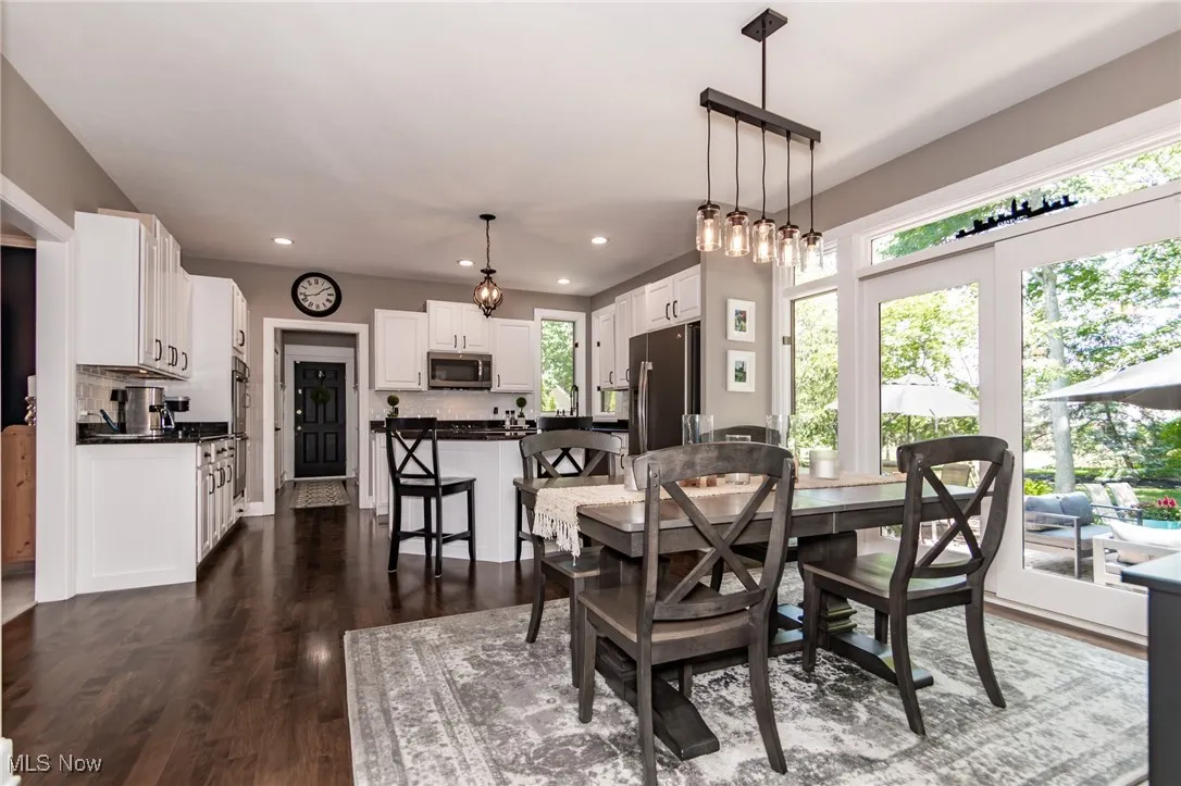 Eat-In Kitchen with recessed lighting and dark wood flooring