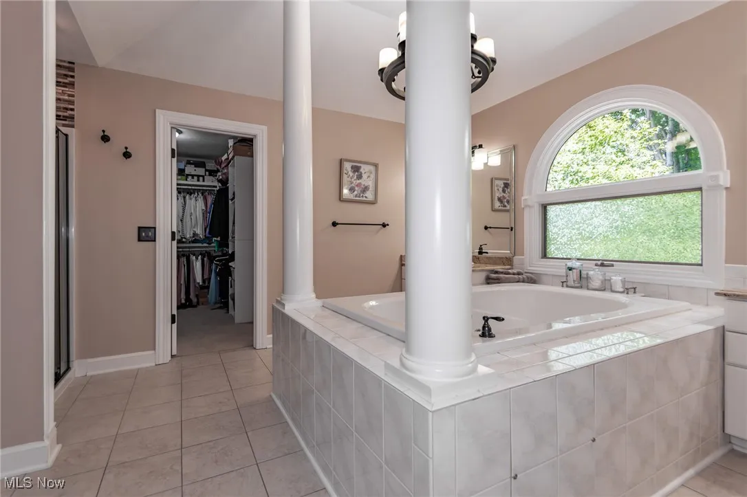 Master Bathroom features a large California walk-in closet