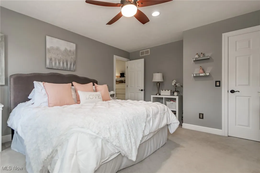 2nd floor guest bedroom with ceiling fan