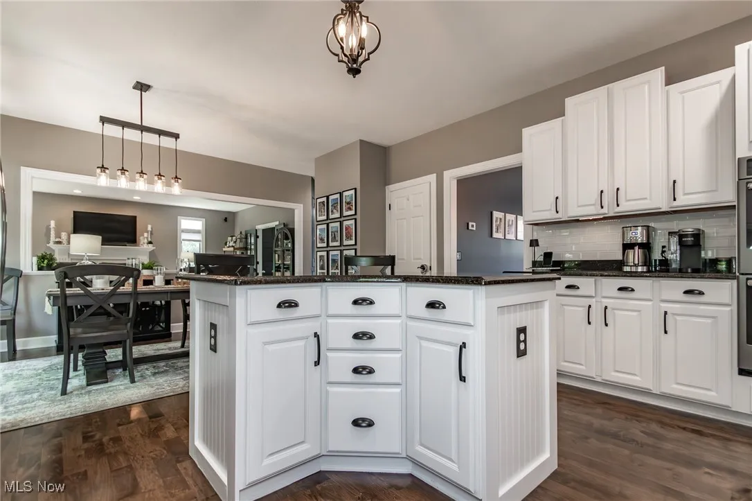 Versatile center island/breakfast bar with storage
