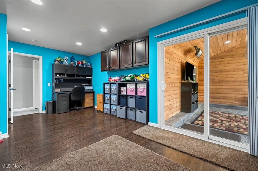 Bedroom with sliding glass door access to Three Seasons Room
