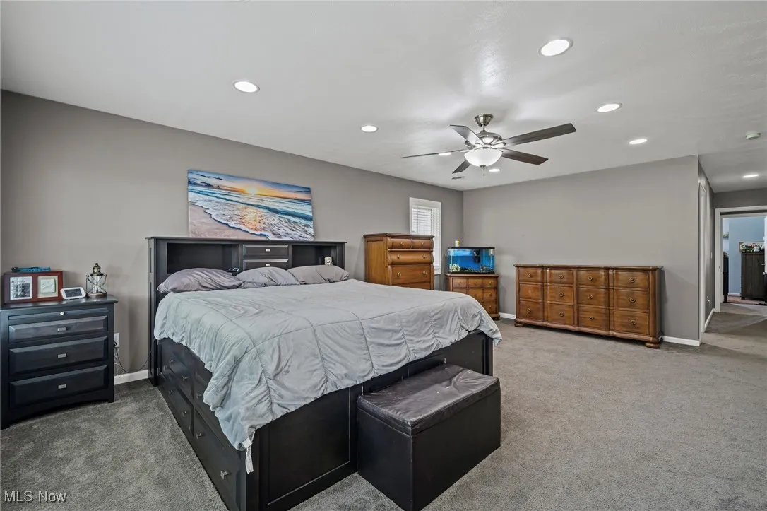 Master Bedroom with carpet floors, recessed lighting, and a ceiling fan