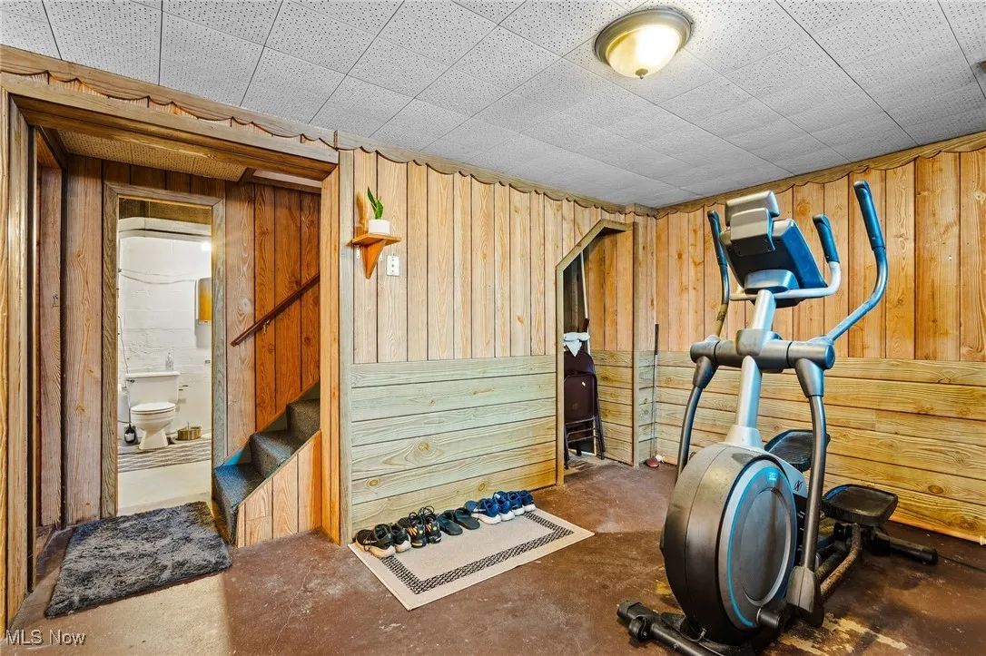 Here is part of the basement recreation room that the seller is using as an exercise space