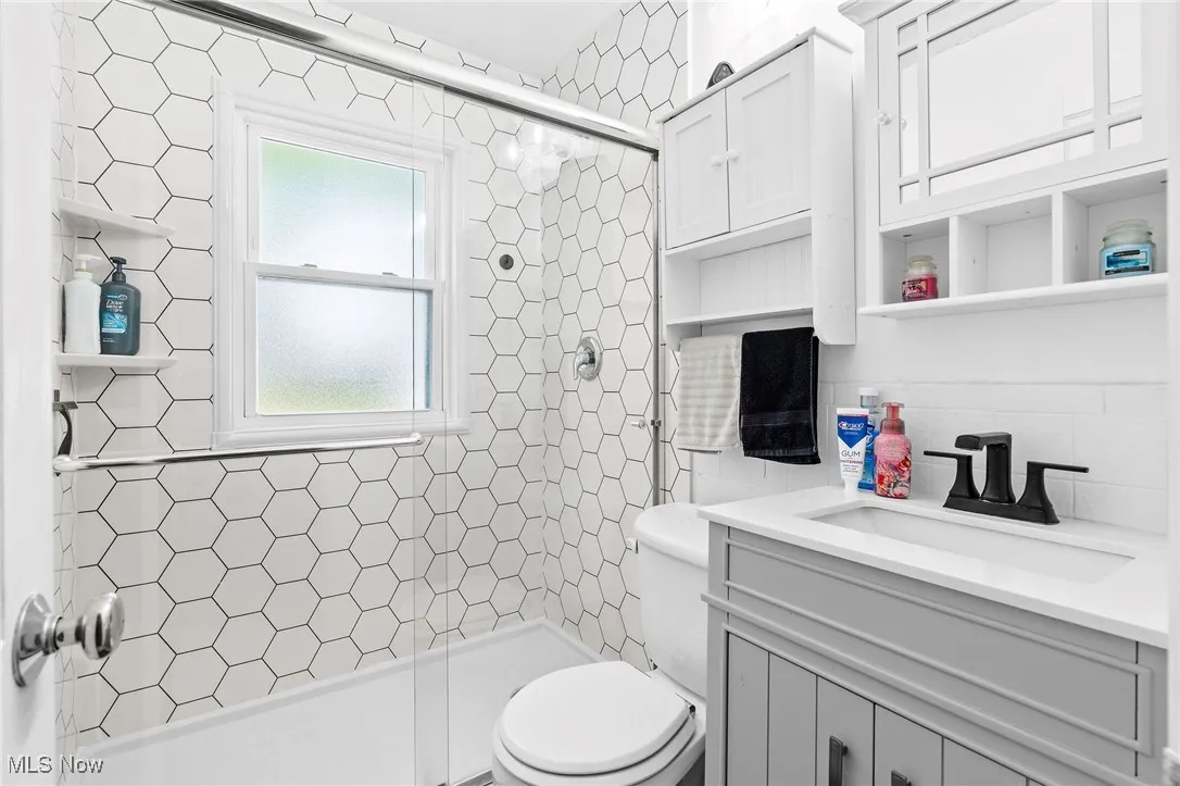 Beautifully UPDATED Full Bath on the main level