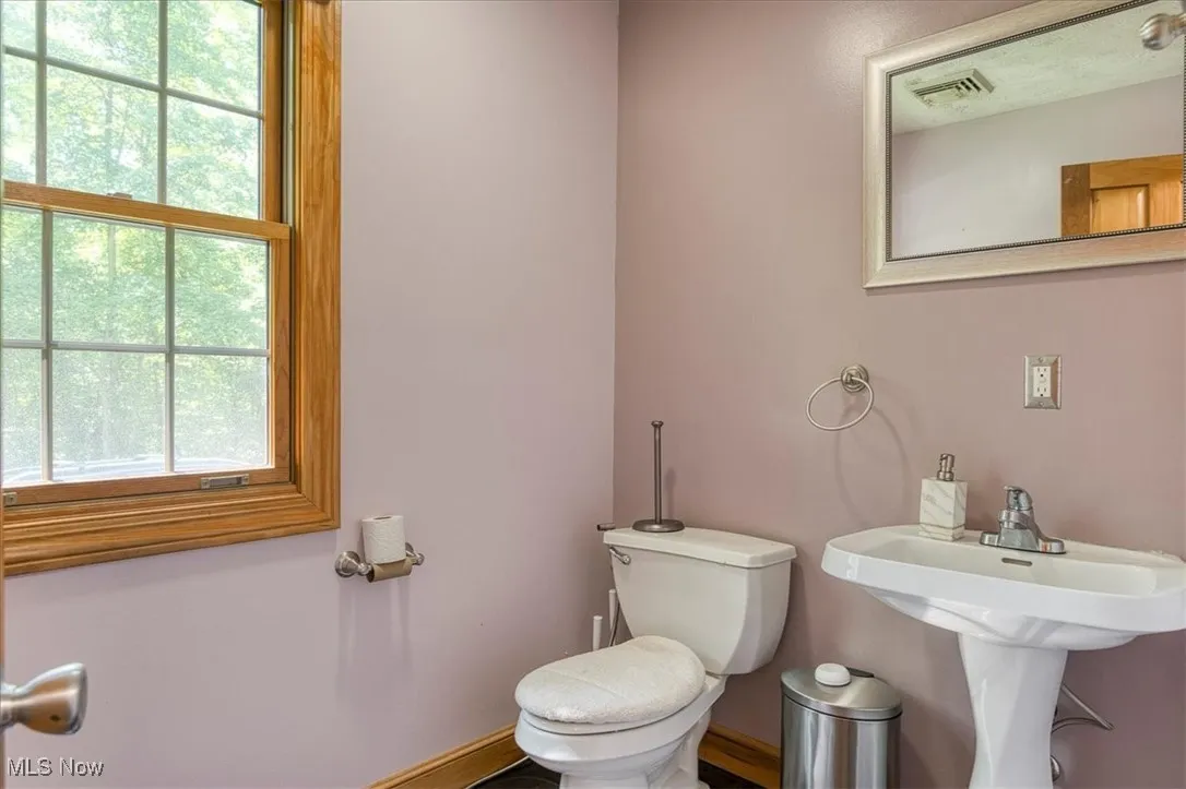 Bathroom featuring healthy amount of natural light