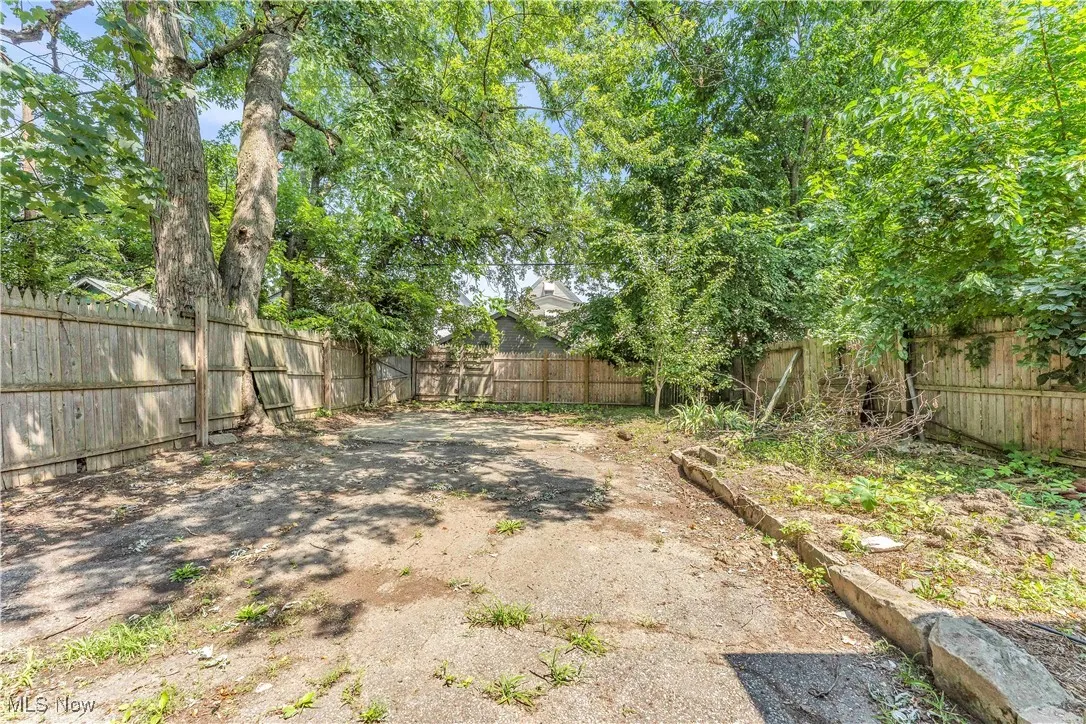 View of fenced backyard