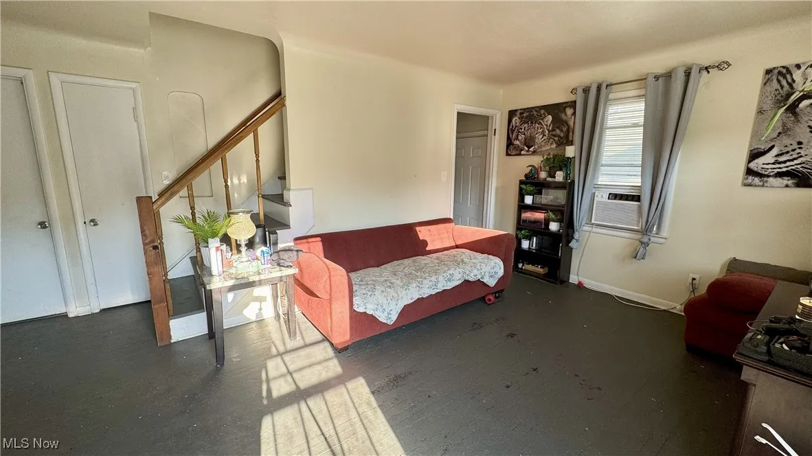 Living area with stairs and cooling unit