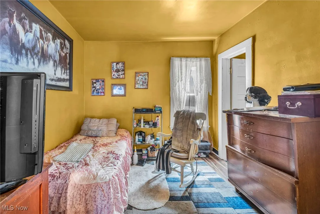 Bedroom featuring wood finished floors
