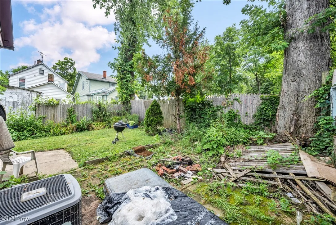 View of fenced backyard