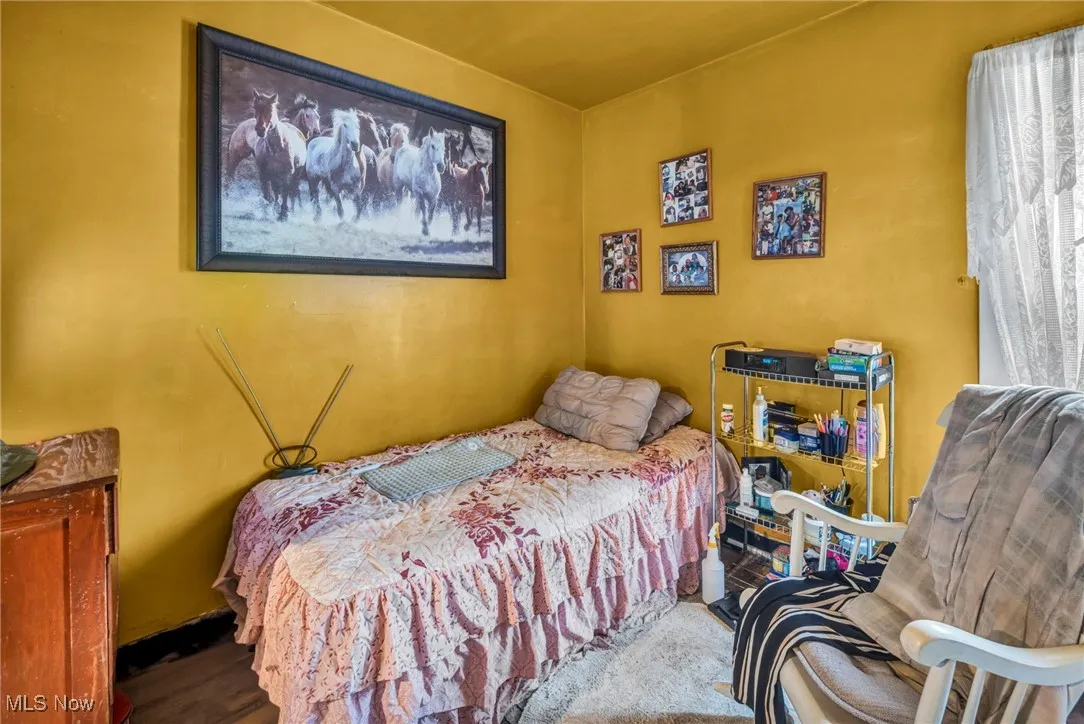 Bedroom featuring wood finished floors