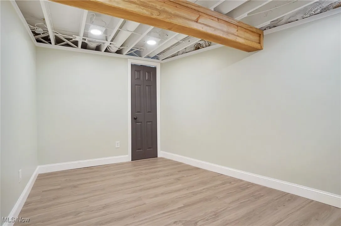 Finished below grade area with wood finished floors