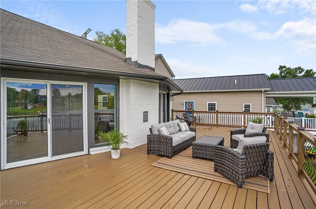 Wooden deck with an outdoor hangout area
