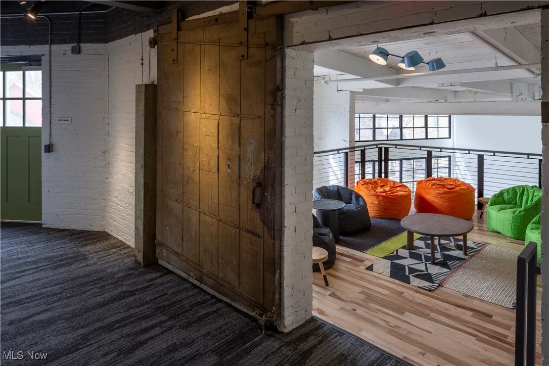 Upper lounge area and doors to rooftop deck
