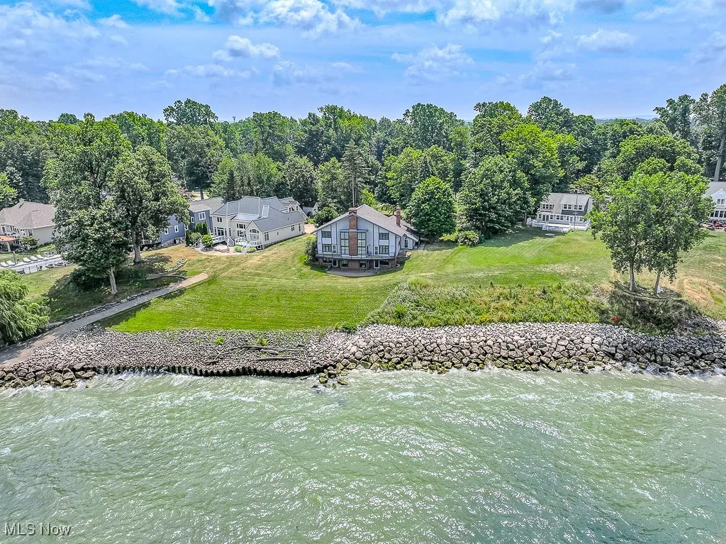 View of subject property featuring a large body of water