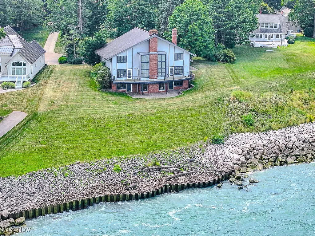 View of subject property featuring a nearby body of water