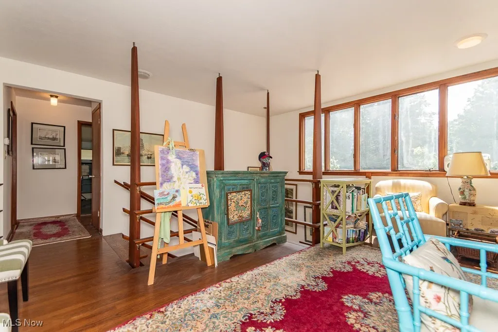 Living area with wood finished floors
