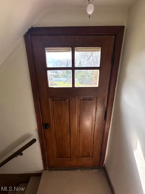 Doorway featuring plenty of natural light
