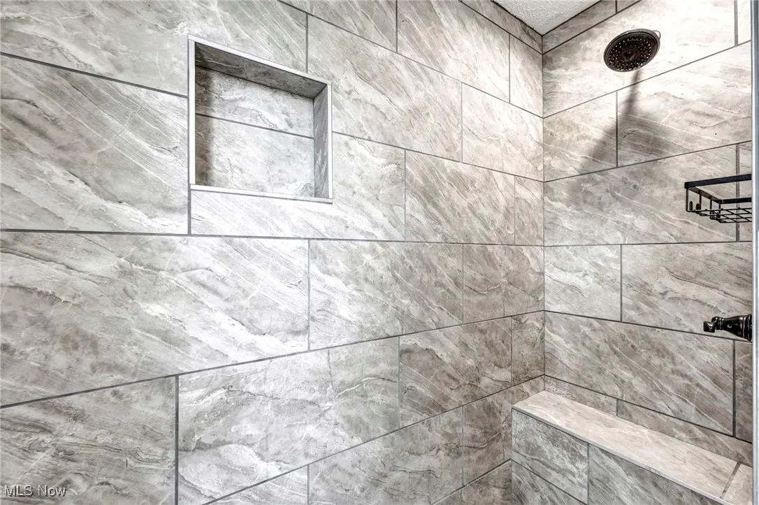 Bathroom view of tiled shower