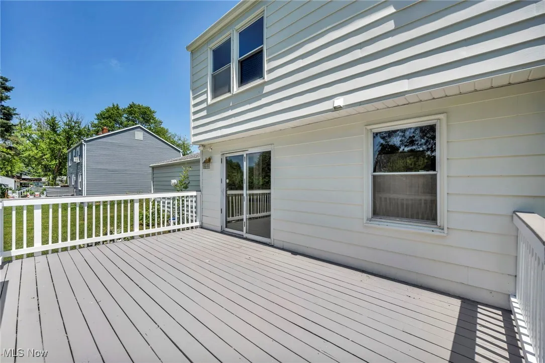 Deck featuring a lawn