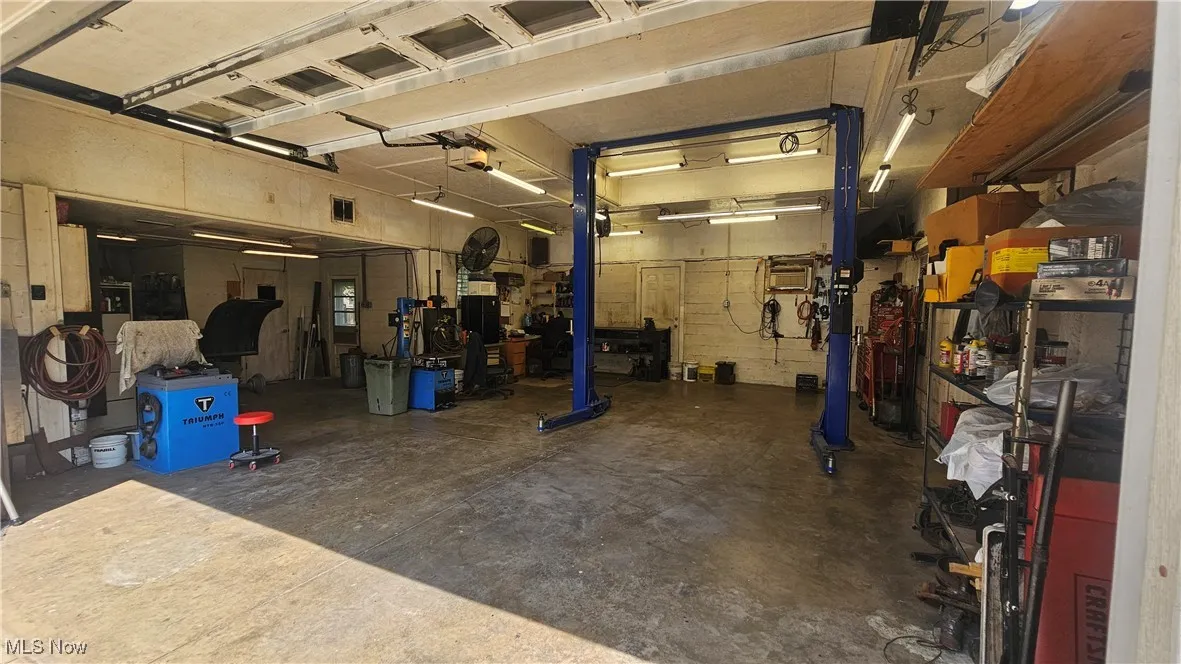 Garage featuring a workshop area