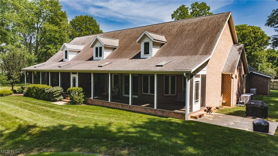 Screened porch is 70 ft long with patio doors entering from Great room and Master suite. The outside patio has a natural gas grill, so you never run out when grilling.
