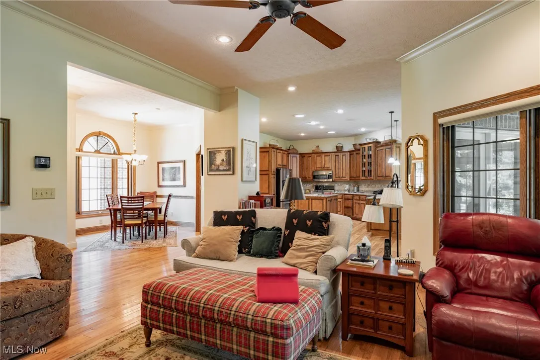 This view shows the open concept design. Notice that the beautiful hardwood floors run throughout.