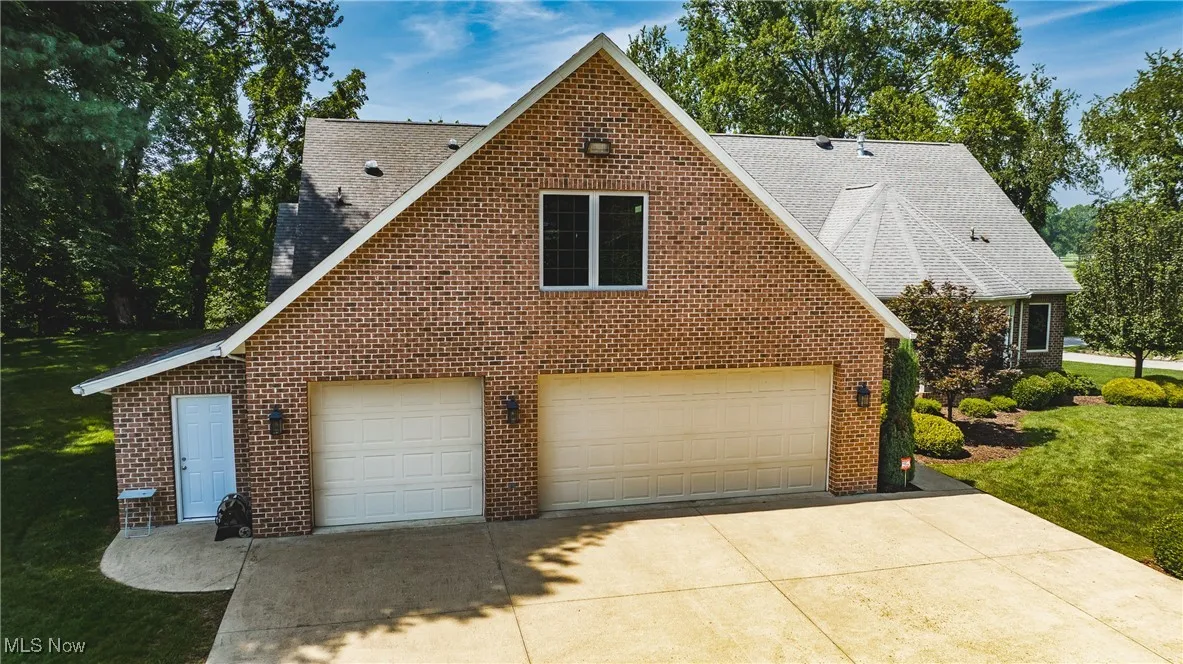 Spacious 3 car built-in garage measures 28 1/2 ft deep by 33 1/2 ft wide. Bonus in-law suite is located above garage.